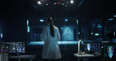 Engineers Working with Quantum Computer Stock Footage 318965690