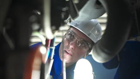 Engineers working in a robotic arm factory, Video stock 262758956