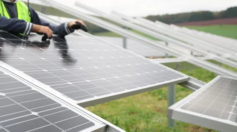 Engineers Working On Solar Panels. Installing solar panels. Stock Footage 40340817
