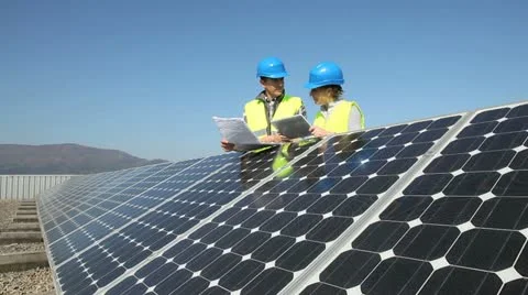 Engineers working on solar panels plant Video stock 14827136