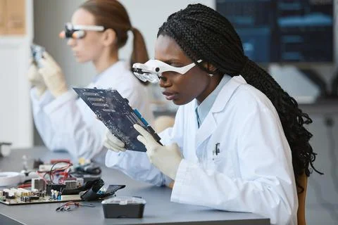Engineers Working with Tech 스톡 사진