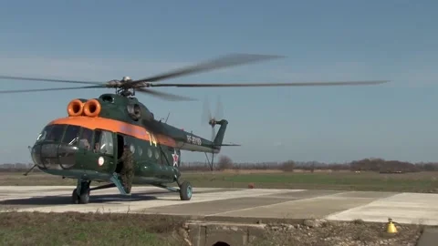 Engines of Mi-8 (Hip) helicopter rotate blades. Close up is tail rotor. Stock Footage 139685229