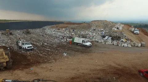 Engines Working in a Garbage Dump Stock Footage 65158241