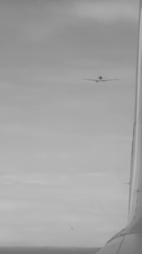 ENGLAND - 1940s - RAF Spitfires fly circles around each other. Stock Footage 342256970