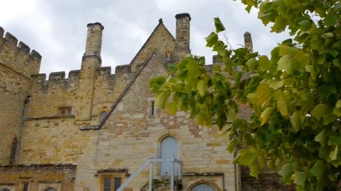 ENGLAND  CIRCA 2011: Fast angle pan to rear entrance at Penshurst Place. Stock Footage 99629342