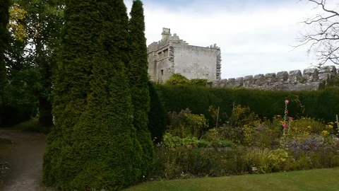 ENGLAND - CIRCA 2011: Fast Pan across castle wall at Thornbury Castle. Stock Footage 99638347
