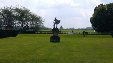 ENGLAND  CIRCA 2011: Man statue and pyramid at Howard Castle. Video stock 99619748