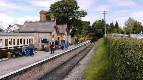 ENGLAND  CIRCA 2011: Pan to old english country train station. Stock Footage 99616569