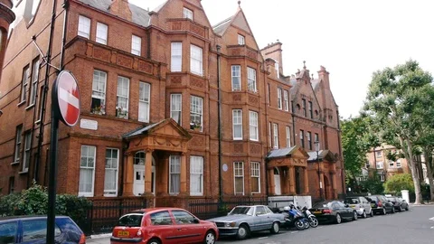 ENGLAND  CIRCA 2011: Red brick apartments. Stock Footage 99642999