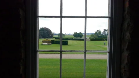ENGLAND  CIRCA 2011: Window view at Howard Castle Stock Footage 99619525