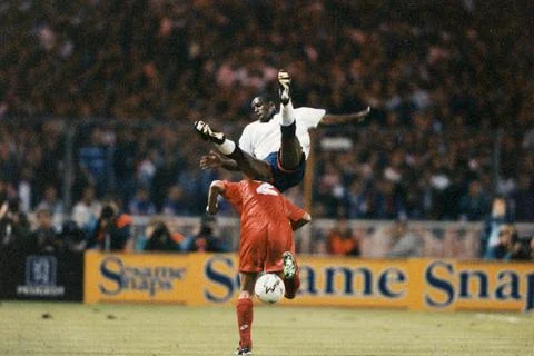 England's Ian Wright Shows The Right Level Of Commitment As He Throws Himself In 写真素材