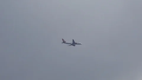 English Airplane Flying in London, Tracking Jet Plane Airliner, Aircraft Stock Footage