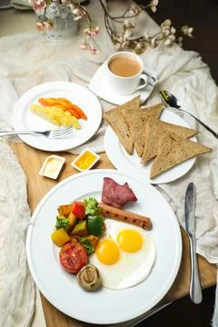 English breakfast with vegetable salad include tomato, potato, lettuce leaf.. Stock Photos
