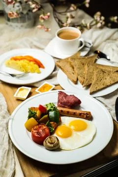 English breakfast with vegetable salad include tomato, potato, lettuce leaf.. Stock Photos