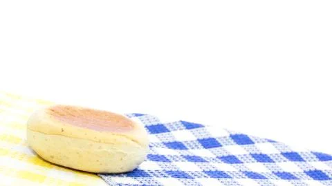 English muffin bread on table mat Stock Photos
