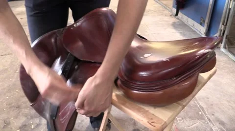 English Saddle Getting Polished Stock Footage 50140377