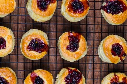 English scones with cream and strawberry jam Stock Photos