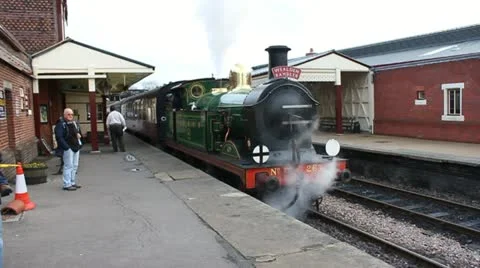 English Steam Train Pulling Off Video stock 12438084