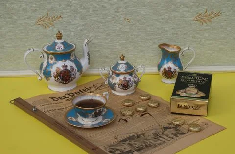 English tea set, a package of Bendick's Elizabethan chocolate mints Stock Photos