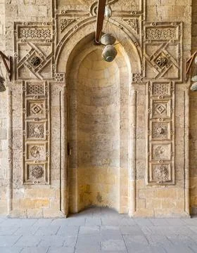 Engraved decorated stone wall with embedded niche in Mamluk era historical Stock Photos