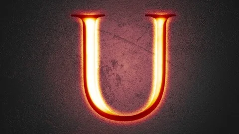 Engraved letter U shining on stone background, seamless looping Stock Footage 73853893