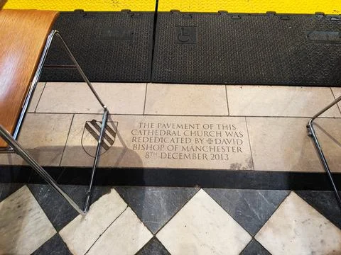 Engraved pavement plaque at Manchester Cathedral, Cathedral and Collegiate .. Stock Photos