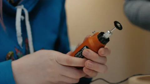 Engraver tool in the hands of the master. Media. Preparing and starting work on Stock-Footage 227331758