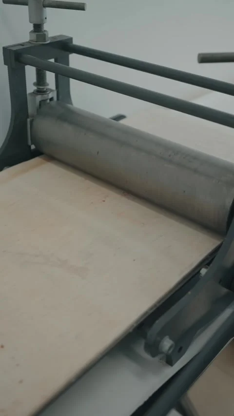 Engraving machine transferring hand drawn metal plate Stock Footage 324351413