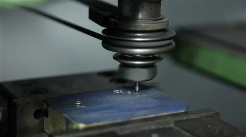 Engraving machine working on a brass piece Stock Footage 58884325