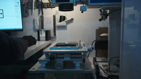 Engraving workshop inside with engraver's workplace,rear view of person sitting Stock-Footage 204036792
