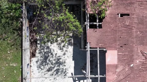 **Enhanced Microstock Description:** Drone footage captures a haunting Stock Footage 341384616