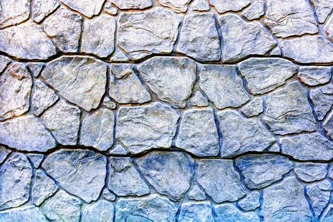 Enhanced Rough Stone Wall Texture. A close-up of an enhanced rough stone wall Stock Photos