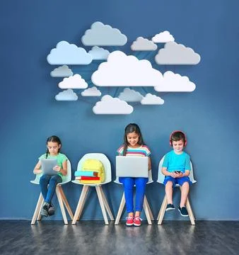 Enhancing the learning process with modern tech. Studio shot of kids sitting on Stock Photos