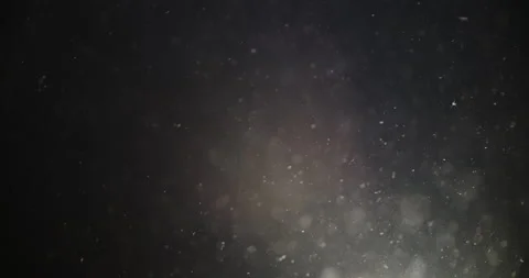 Enigmatic and Mysterious Floating Particles in the Dark Space Stockbeeldmateriaal 301545881