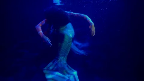 enigmatic mermaid with big tail is float... | Stock Video | Pond5