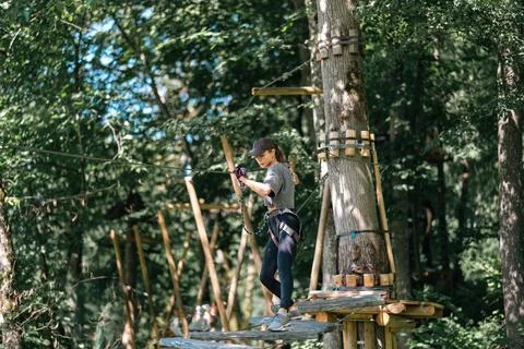Enjoy an Adventurous Tree Climbing Experience in Beautiful Nature Like Neve.. Stock Photos
