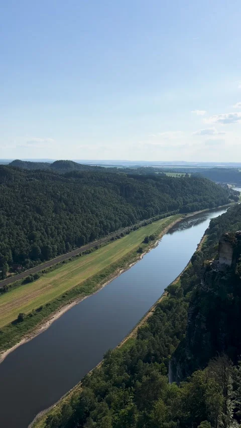 Enjoy breathtaking views of the Elbe River amidst rolling hills Stock Footage 303894524