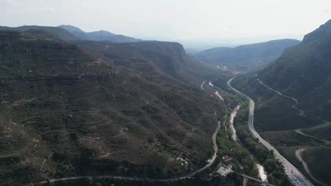 Enjoy breathtaking views of a mountain valley with a winding river Stock Footage 287126745