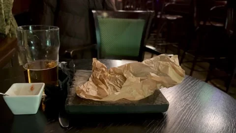 Enjoy a cozy evening of relaxation while sipping a drink and indulging in a Vidéo 302099751