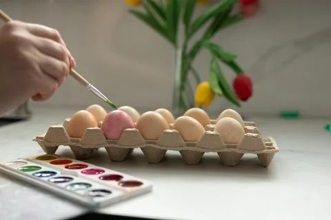 Enjoy an exciting and colorful Easter egg decorating experience using vibrant Stock Photos