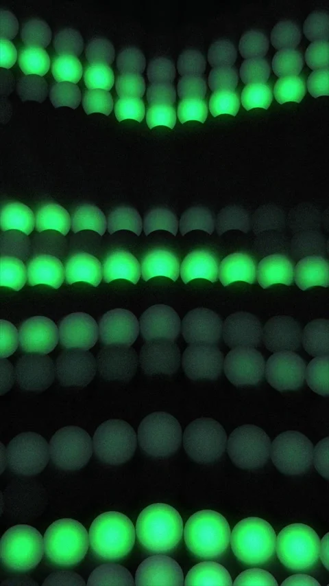 Enjoy glowing green circles in dynamic motion against a dark backdrop Stock Footage 314316417