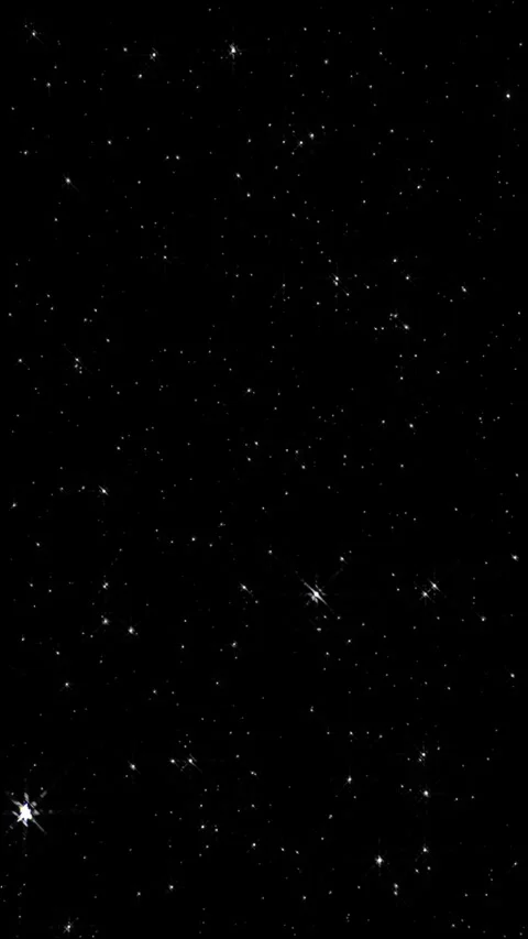 Enjoy a mesmerizing motion background of twinkling stars on a dark space Video stock 314622473