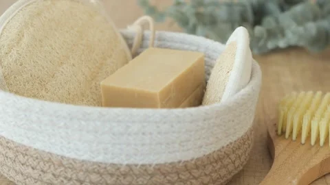 Enjoy a Natural Spa Set with soap, body brushes, and loofah o Stock Footage 297041973