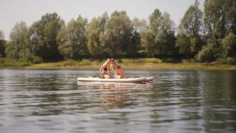 Enjoy a Relaxing Summer Full of Fun on the Water with Close Friends and Good Stock Footage 312461028