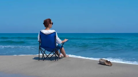 Enjoy the solitude by the sea Stock Footage 303450005