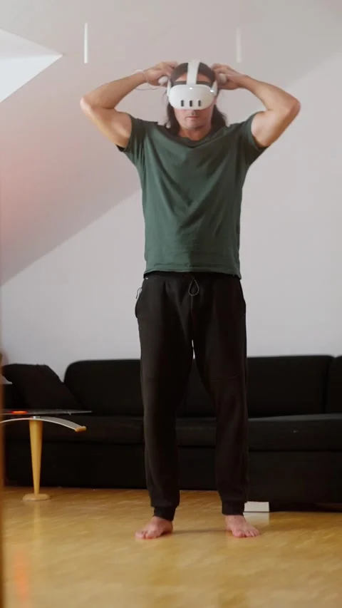 Enjoy a thrilling Virtual Reality Experience from the comfort of your own home Stock Footage 294616003