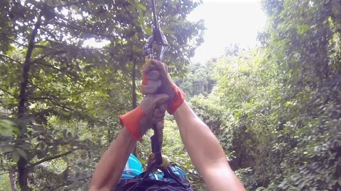 Enjoyable Zip Line Above Rain Forest of Costa Rica Stock Footage