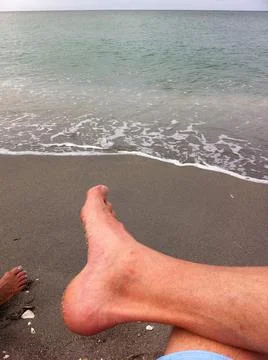 Enjoying in the beach Stock Photos
