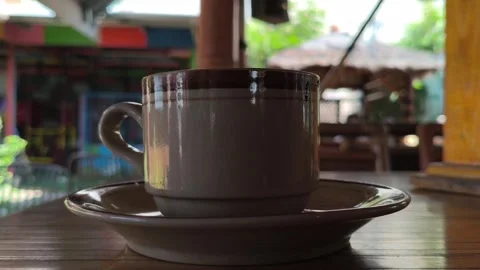Enjoying Black Coffee During a Focused Work Session Stock Footage 338378552