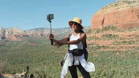 Enjoying the breathtaking views while hiking in Sedona's desert landscape Stock Footage 312645254